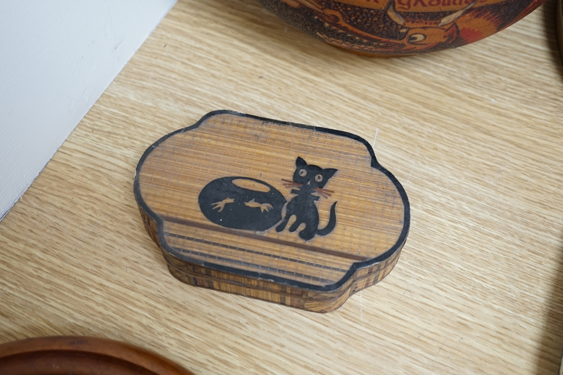 A group of wood items to include two cribbage boards, a mahogany solitaire board with marbles, a truncheon and an inlaid oval tray. etc., largest 60cm wide. Condition - varies, poor to fair